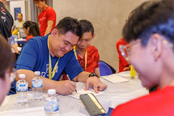 Person with special needs engaging in a writing activity.